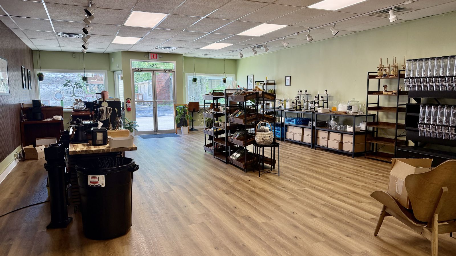 Inside Fig Tree Market — the coffee bar, refill shelves, and seating